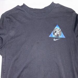 Nike Men's Black Tee with Blue Graphic